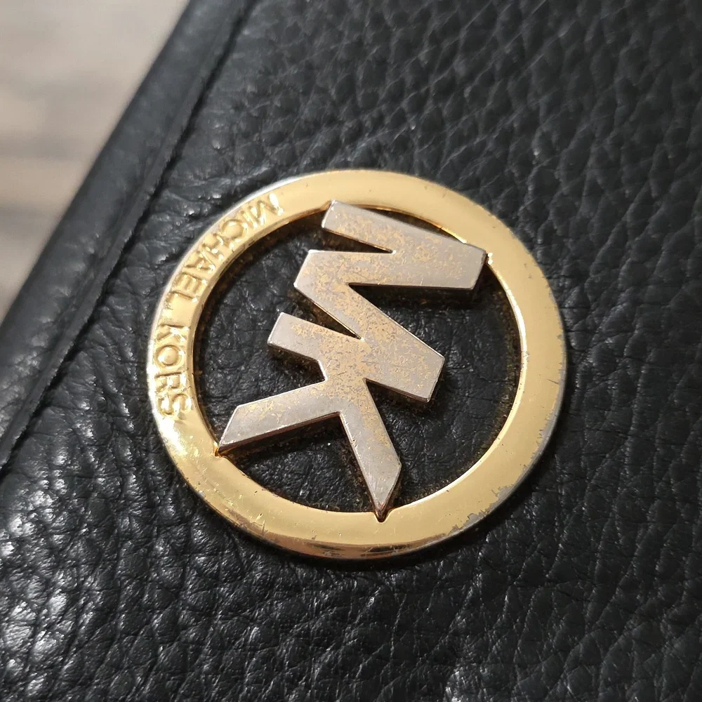 Michael Kors Fulton Large Flap Continental Wallet in black pebbled leather